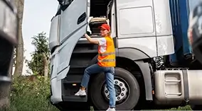 Fleet manager assigning drivers on a digital dashboard, enhancing performance with Fleet Service 365 for Microsoft Dynamics 365.